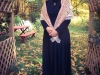 JoAnne in the rose arbor