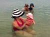 The whole family wading in the Gulf