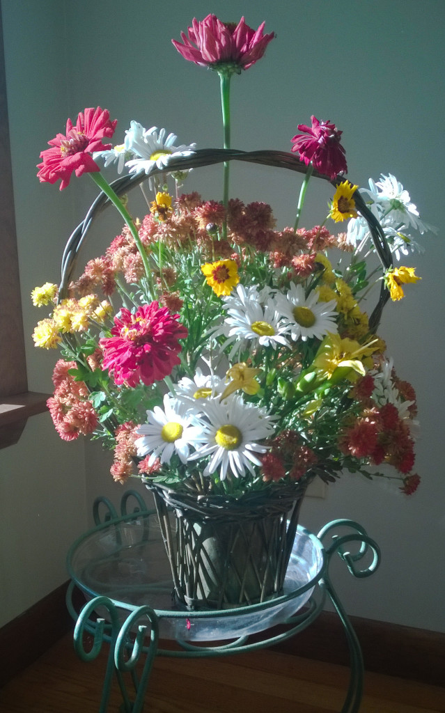 Flowers rescued from the first frost and arranged in a basket that was my grandmother's