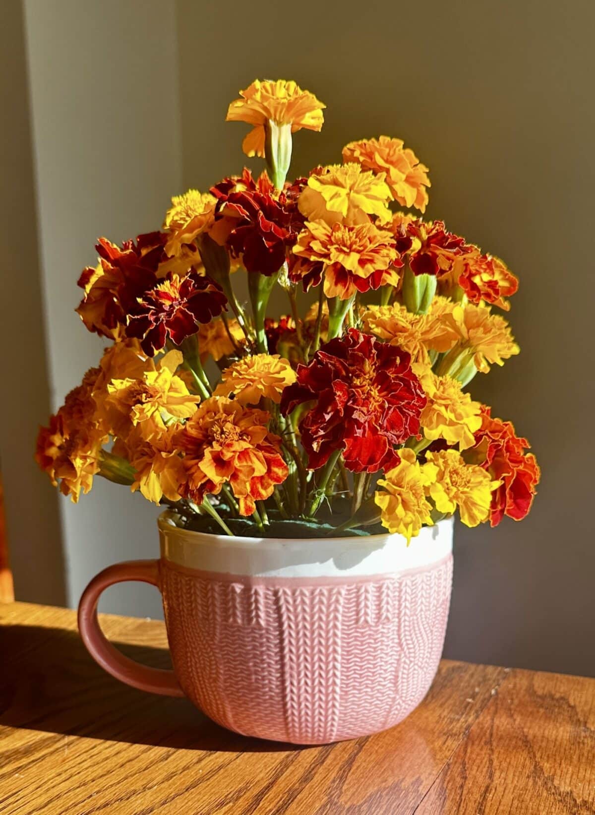 Cup of marigolds